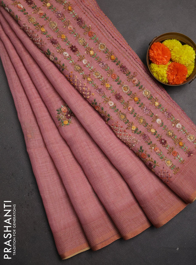 Linen saree peach shade with embroidery buttas and embroidery pallu