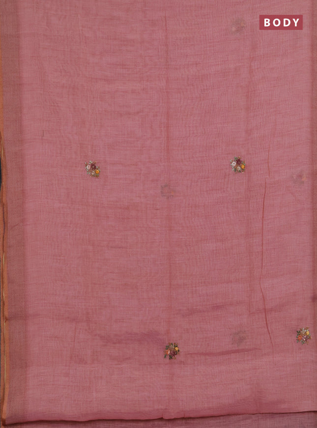 Linen saree peach shade with embroidery buttas and embroidery pallu