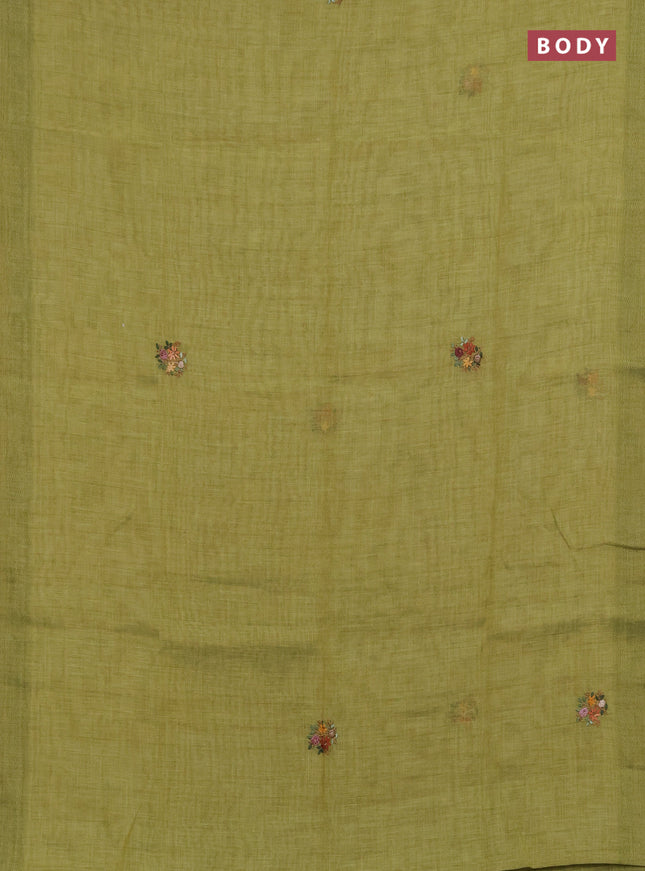 Linen saree light green with embroidery buttas and embroidery pallu