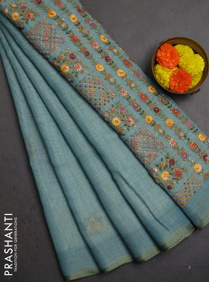 Linen saree pastel blue with embroidery buttas and embroidery pallu