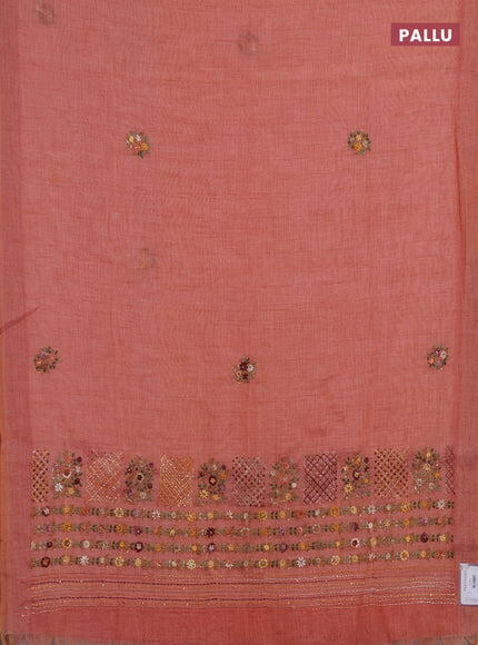 Linen saree dark peach with embroidery buttas and embroidery pallu
