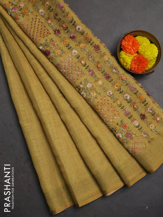 Linen saree dark mustard with embroidery buttas and embroidery pallu