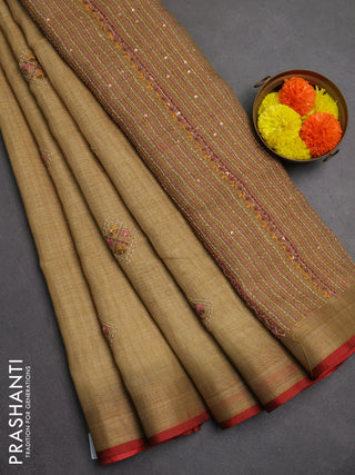 Linen saree sandal and maroon with embroidery buttas and embroidery pallu