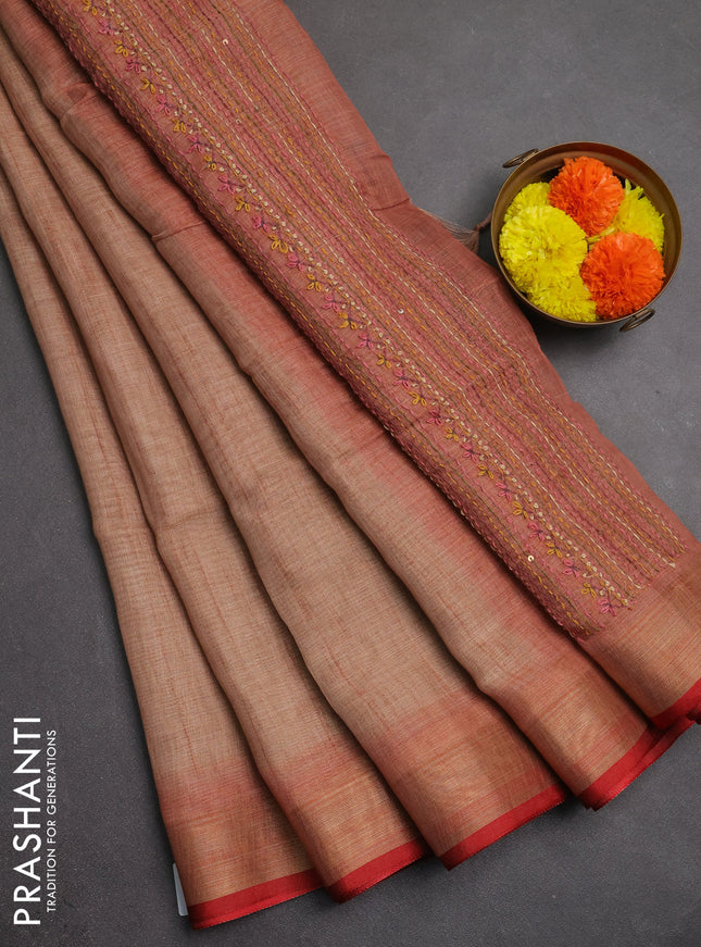 Linen saree rust shade and maroon with embroidery buttas and embroidery pallu