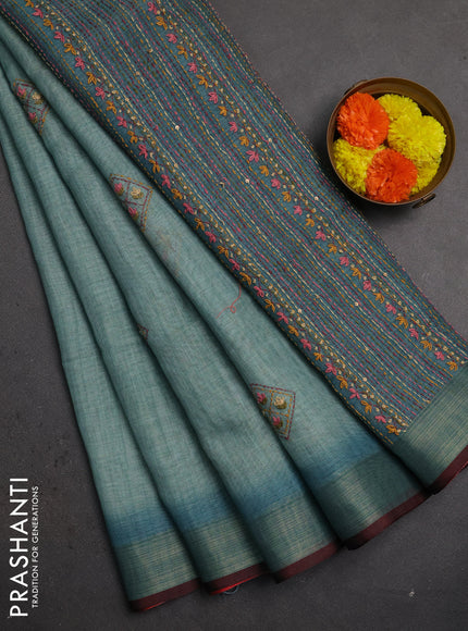 Linen saree teal blue and maroon with embroidery buttas and embroidery pallu