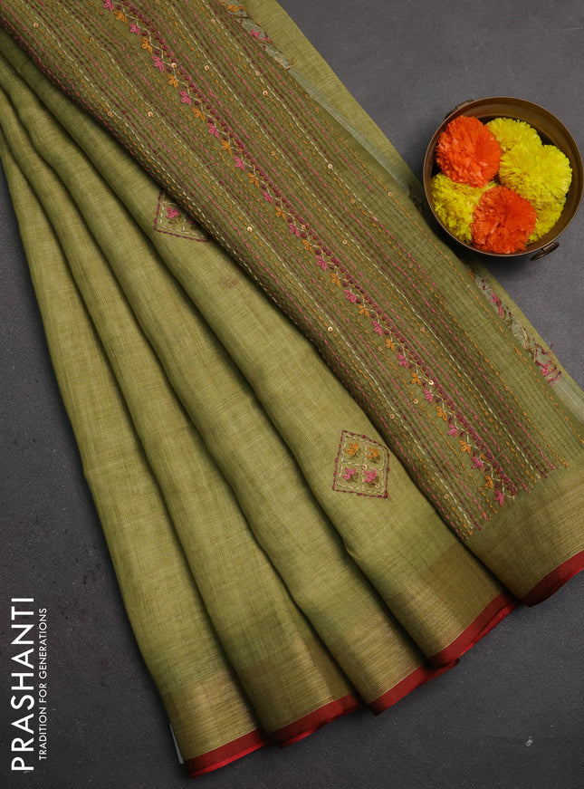 Linen saree light green and maroon with embroidery buttas and embroidery pallu