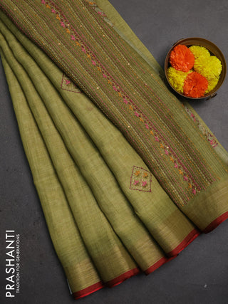 Linen saree light green and maroon with embroidery buttas and embroidery pallu