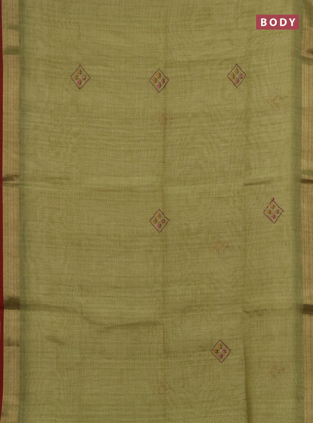 Linen saree light green and maroon with embroidery buttas and embroidery pallu