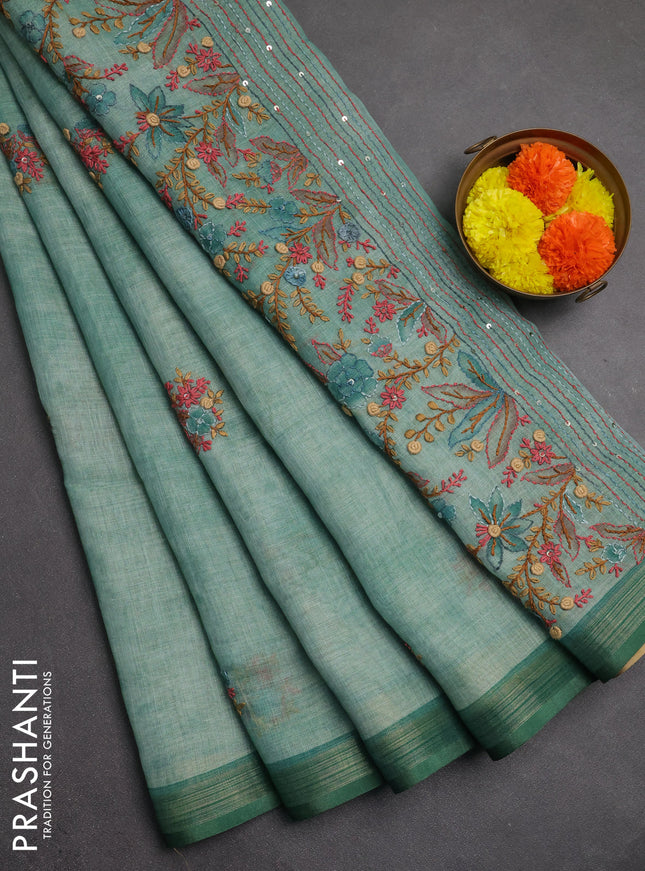 Linen saree teal green with embroidery buttas and embroidery pallu