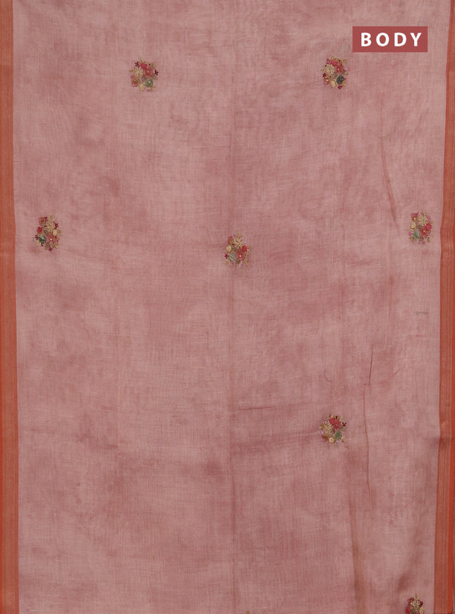 Linen saree peach shade with embroidery buttas and embroidery pallu