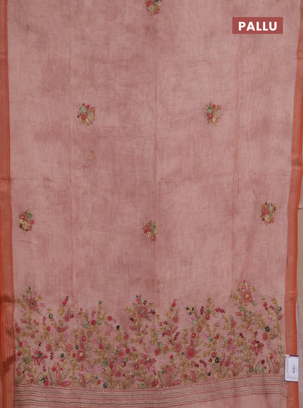 Linen saree peach shade with embroidery buttas and embroidery pallu