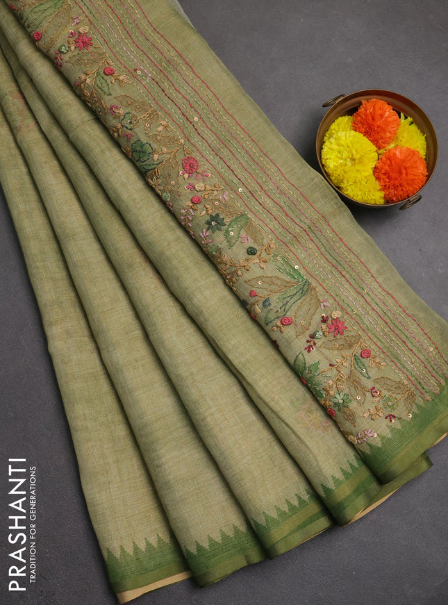 Linen saree pastel green with embroidery buttas and embroidery pallu