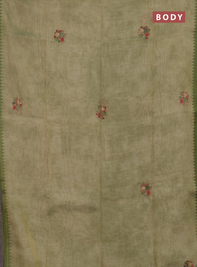 Linen saree pastel green with embroidery buttas and embroidery pallu