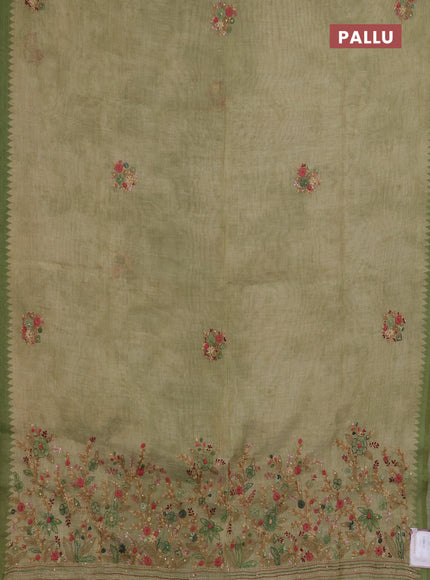 Linen saree pastel green with embroidery buttas and embroidery pallu