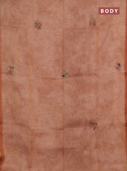 Linen saree rust shade with embroidery buttas and embroidery pallu