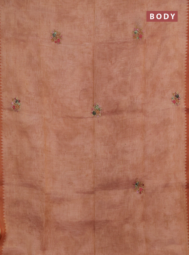 Linen saree rust shade with embroidery buttas and embroidery pallu