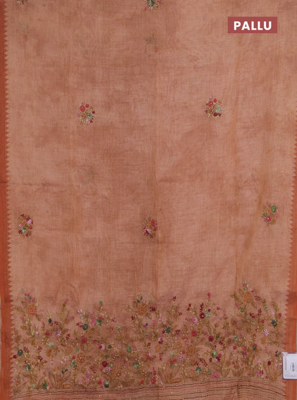 Linen saree rust shade with embroidery buttas and embroidery pallu