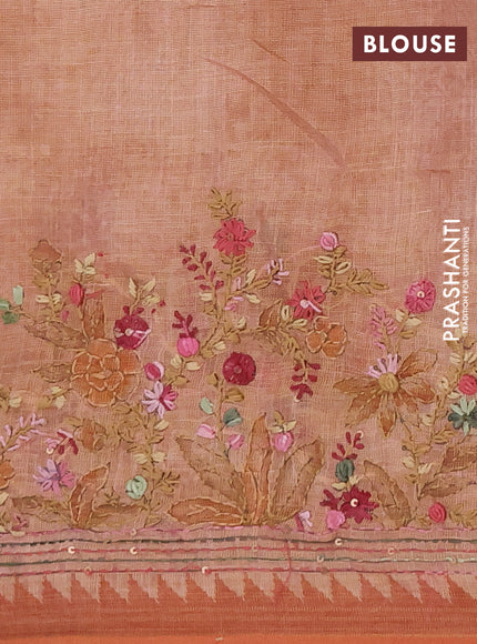 Linen saree rust shade with embroidery buttas and embroidery pallu