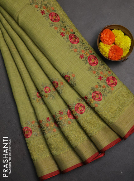 Linen saree light green and maroon with embroidery buttas and embroidery pallu & border