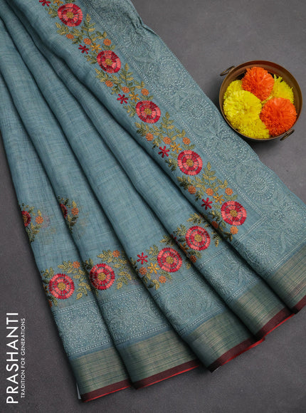 Linen saree pastel blue and maroon with embroidery buttas and embroidery pallu & border
