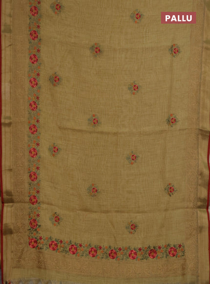 Linen saree mustard yellow and maroon with embroidery buttas and embroidery pallu & border