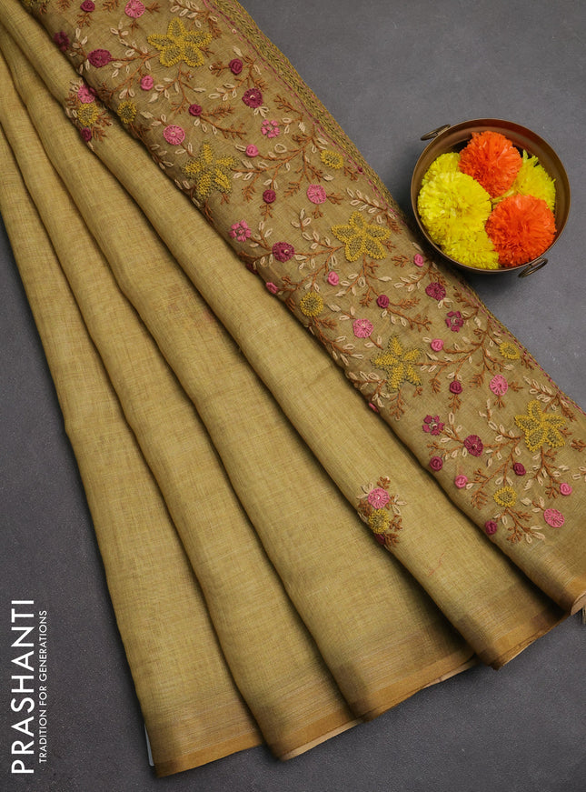 Linen saree mustard yellow with embroidery buttas and embroidery pallu