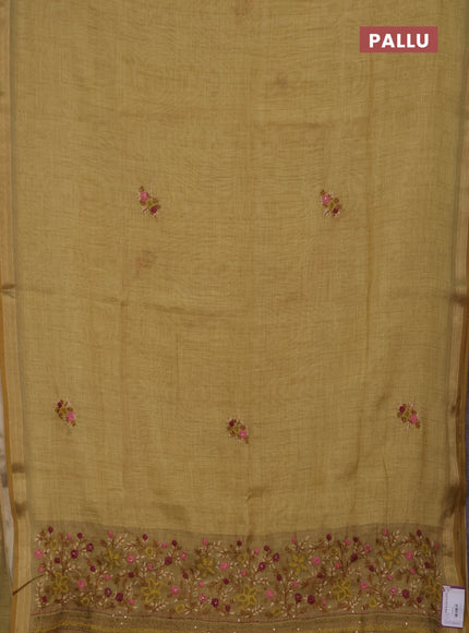 Linen saree mustard yellow with embroidery buttas and embroidery pallu
