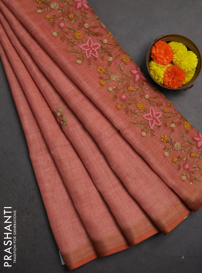 Linen saree dark peach with embroidery buttas and embroidery pallu