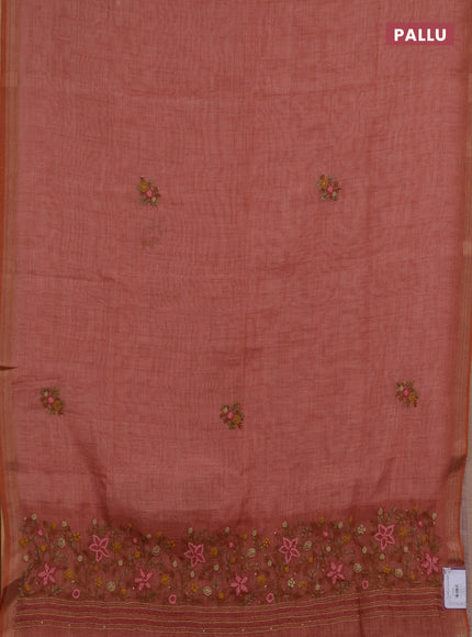 Linen saree dark peach with embroidery buttas and embroidery pallu