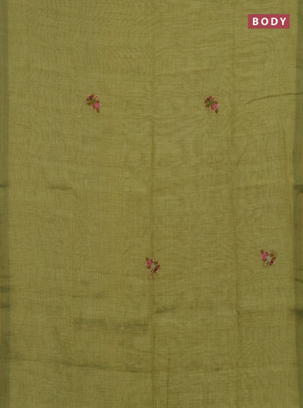 Linen saree light green with embroidery buttas and embroidery pallu
