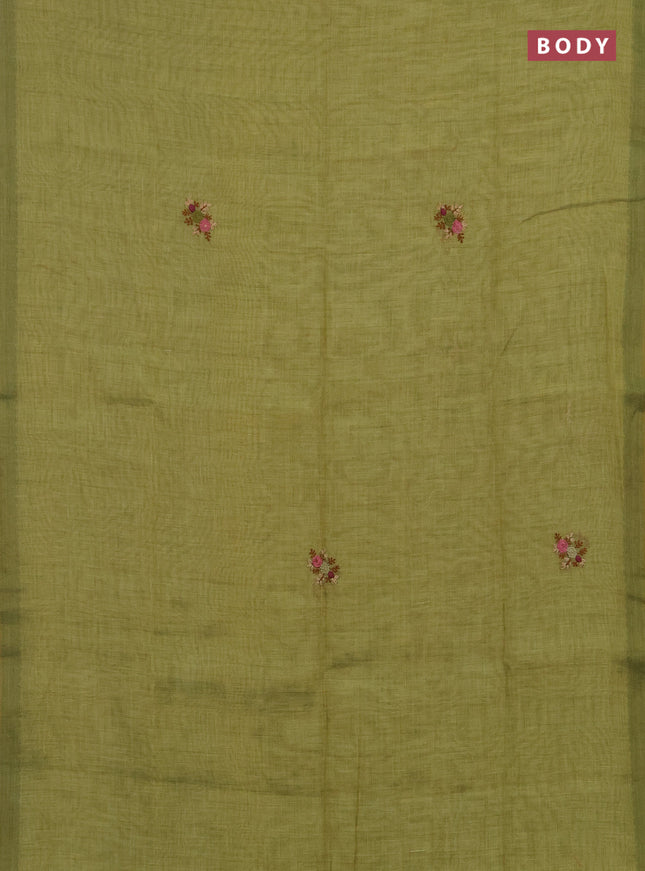 Linen saree light green with embroidery buttas and embroidery pallu