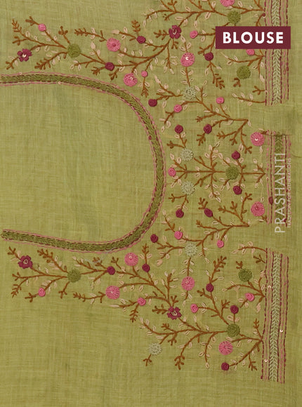 Linen saree light green with embroidery buttas and embroidery pallu
