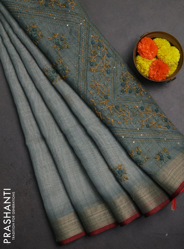 Linen saree pastel blue and maroon with embroidery buttas and embroidery pallu