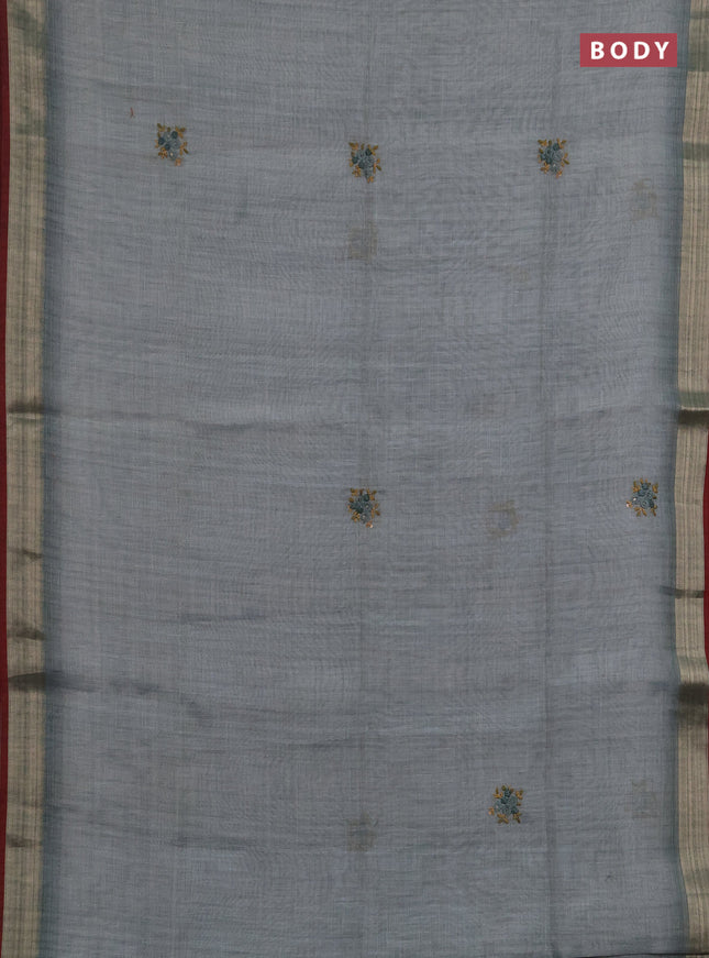 Linen saree pastel blue and maroon with embroidery buttas and embroidery pallu