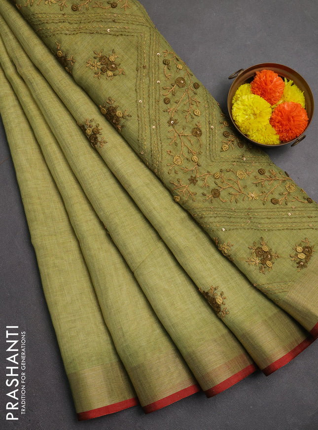 Linen saree light green and maroon with embroidery buttas and embroidery pallu