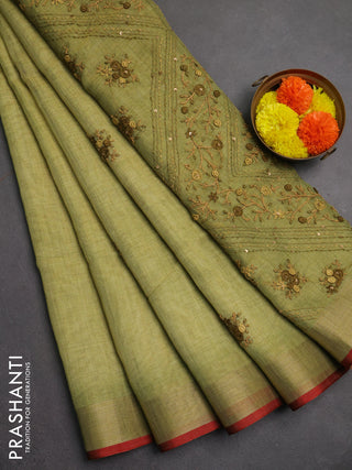 Linen saree light green and maroon with embroidery buttas and embroidery pallu