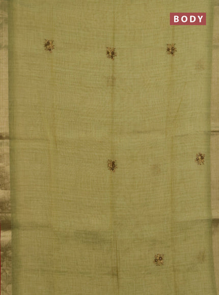 Linen saree light green and maroon with embroidery buttas and embroidery pallu