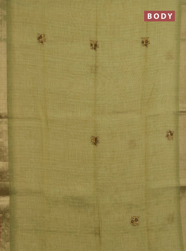 Linen saree light green and maroon with embroidery buttas and embroidery pallu