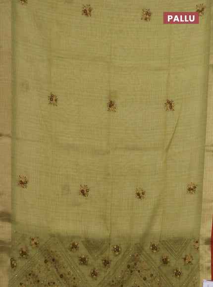 Linen saree light green and maroon with embroidery buttas and embroidery pallu