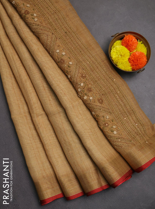 Linen saree dark mustard and maroon with embroidery buttas and embroidery pallu