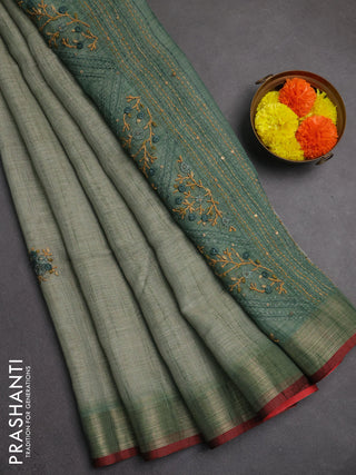 Linen saree pastel green and maroon with embroidery buttas and embroidery pallu