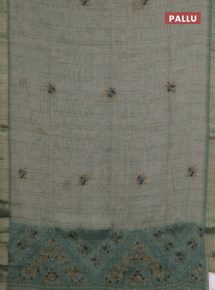 Linen saree pastel green and maroon with embroidery buttas and embroidery pallu