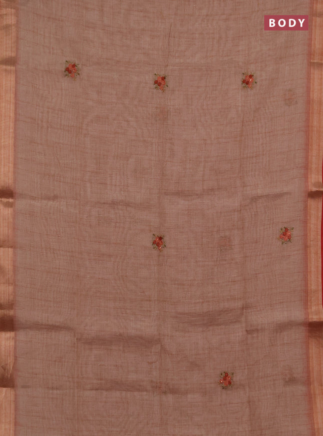 Linen saree rust shade and maroon with embroidery buttas and embroidery pallu