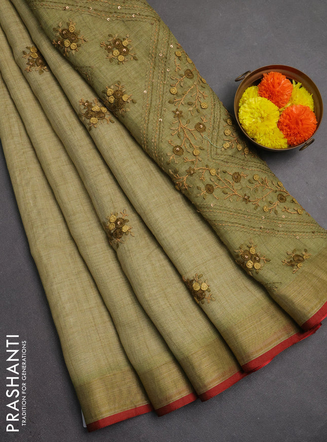 Linen saree light green and maroon with embroidery buttas and embroidery pallu