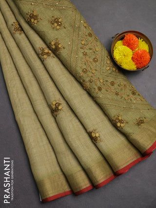 Linen saree light green and maroon with embroidery buttas and embroidery pallu
