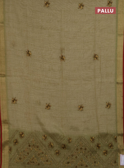 Linen saree light green and maroon with embroidery buttas and embroidery pallu