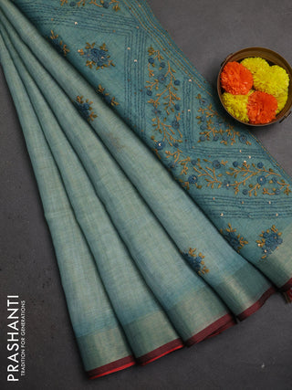 Linen saree teal blue and maroon with embroidery buttas and embroidery pallu