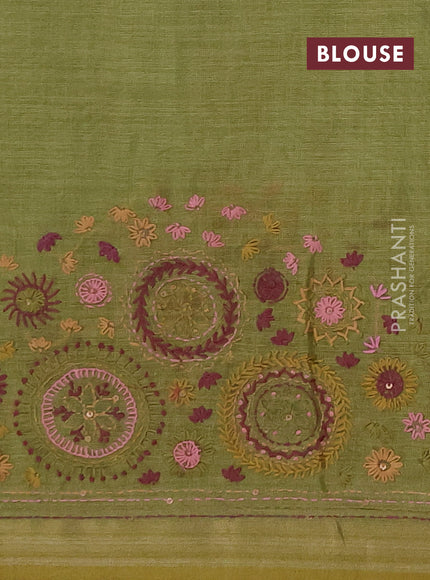 Linen saree light green with embroidery buttas and embroidery pallu