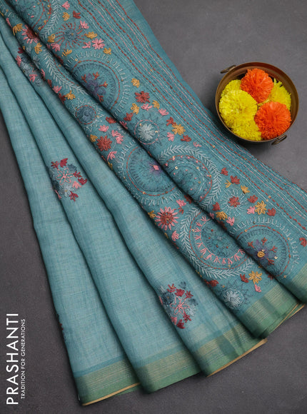 Linen saree teal blue with embroidery buttas and embroidery pallu