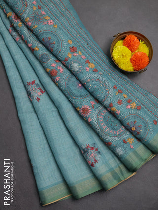 Linen saree teal blue with embroidery buttas and embroidery pallu